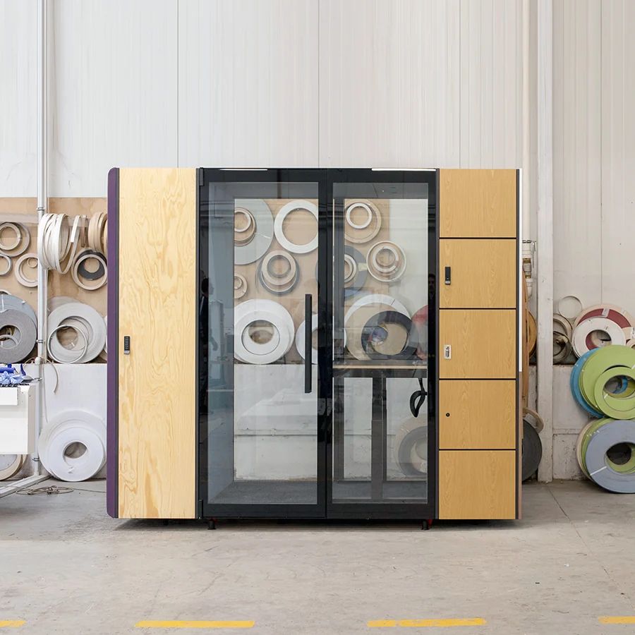 Acoustic booth storage linkage shown in a showroom