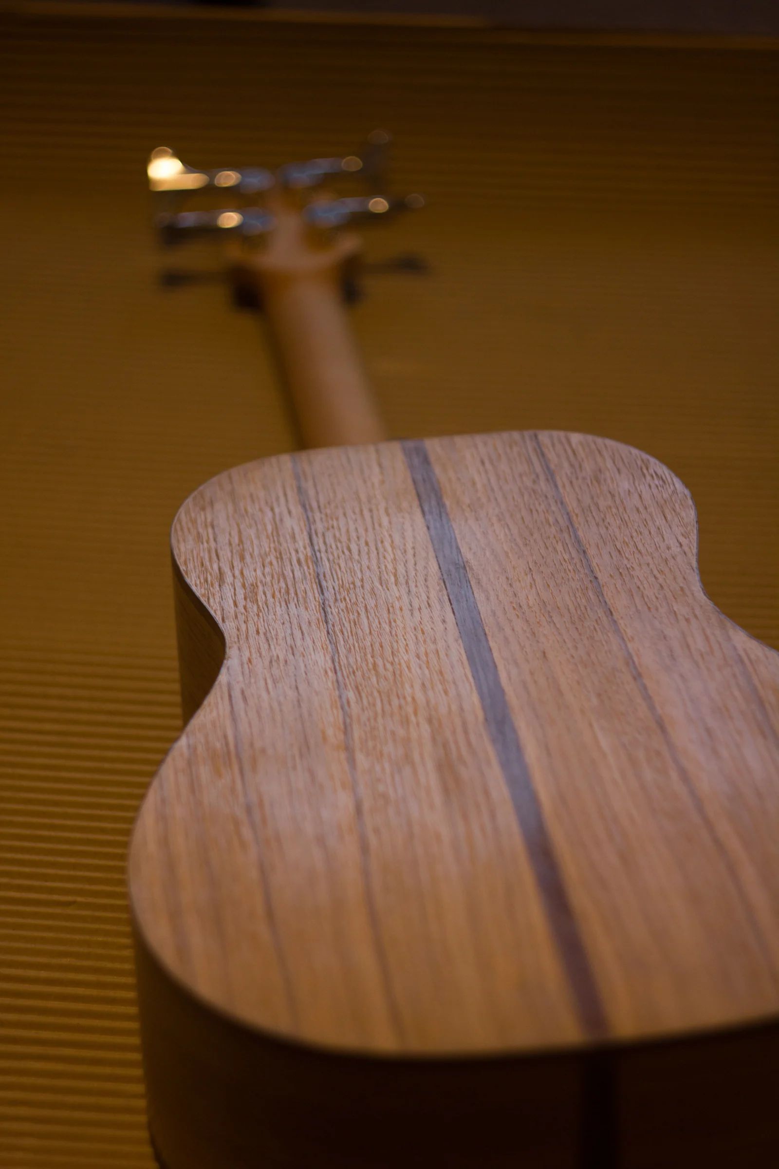 Back detail of the handmade acoustic uke-bass
