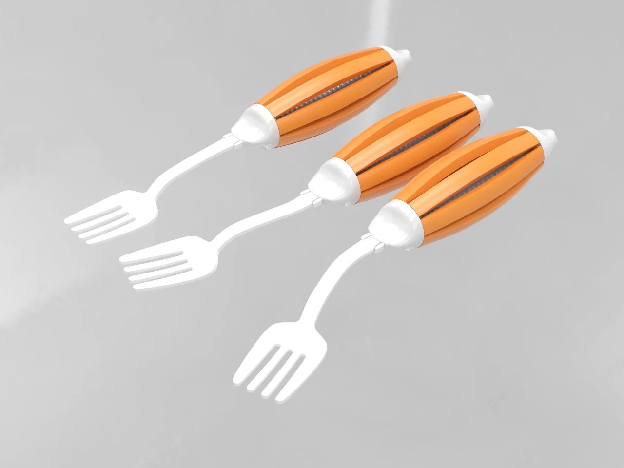 Two adaptive forks with orange ergonomic handles