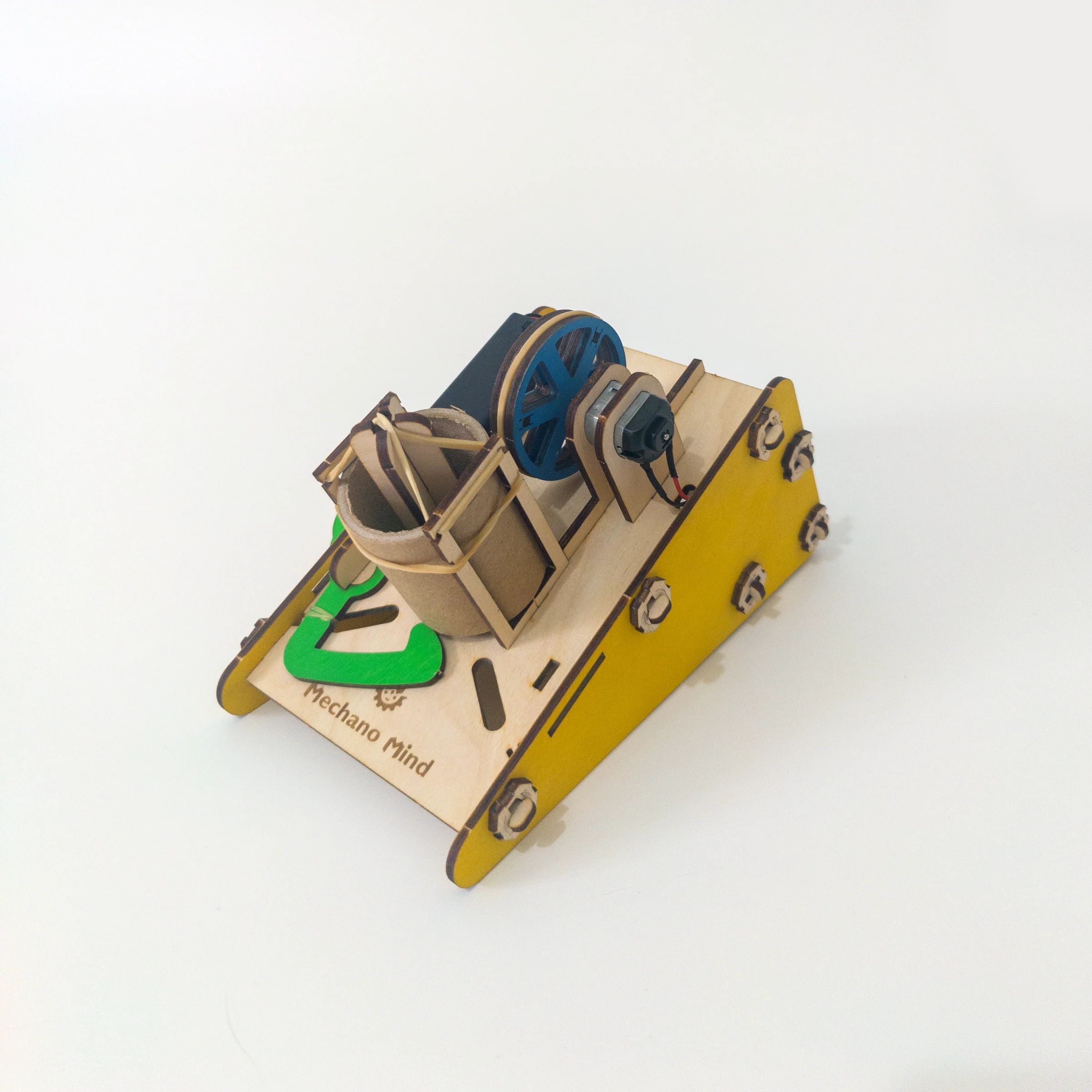 Close-up of the layered wooden mechanism inside the disk launcher