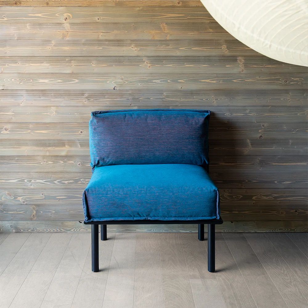 Single blue upholstered modular lounge chair